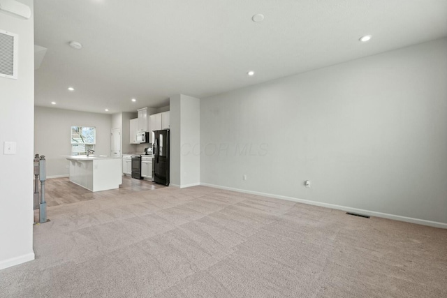 858 Blackcomb Dr, Cincinnati, OH 45244 - unfurnished living room featuring recessed lighting, visible vents, light colored carpet, and baseboards