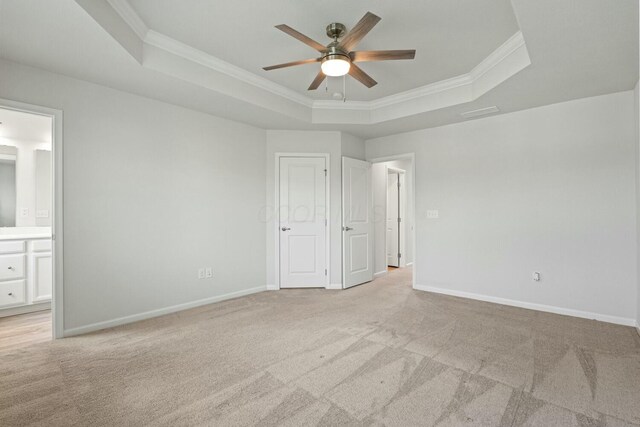 858 Blackcomb Dr, Cincinnati, OH 45244 - unfurnished bedroom with crown molding, baseboards, a raised ceiling, and light carpet