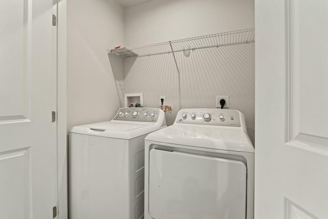 858 Blackcomb Dr, Cincinnati, OH 45244 - washroom featuring washing machine and clothes dryer and laundry area