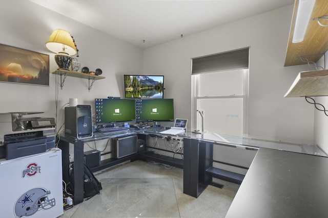 home office featuring concrete flooring
