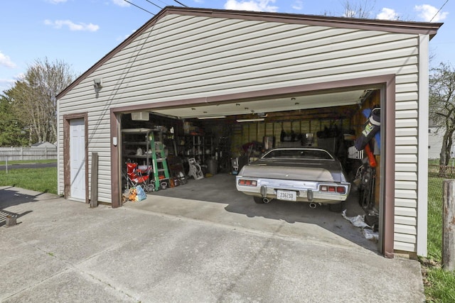 garage with fence