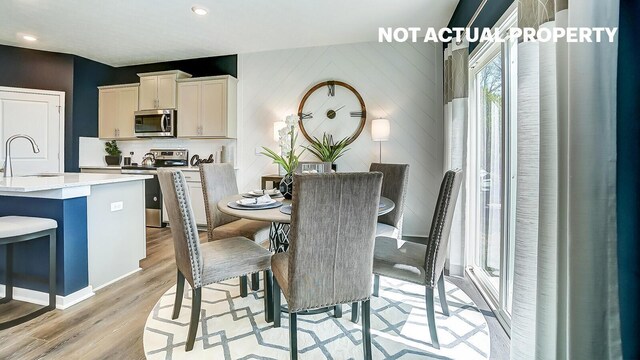 dining area with light wood-type flooring