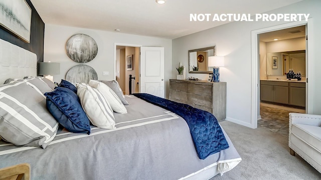 bedroom with recessed lighting, carpet, ensuite bathroom, and baseboards
