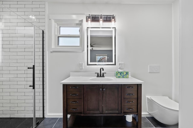 2209 Fishinger Rd, Columbus, OH 43221 - full bath featuring vanity, toilet, a ceiling fan, and a stall shower