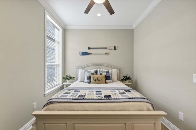 bedroom featuring ceiling fan, baseboards, and ornamental molding