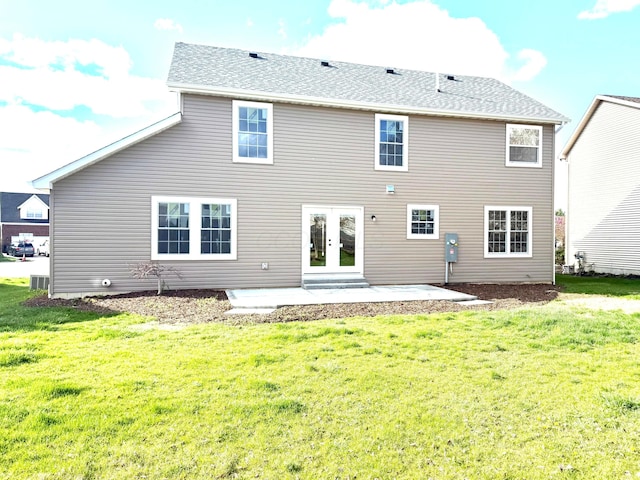 9465 Santa Clara Cir, Plain City, OH 43064 - back of property featuring french doors, central air condition unit, a yard, and a patio area