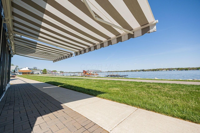 view of patio featuring a water view