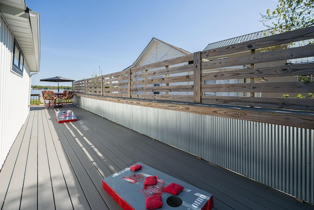 deck featuring outdoor dining area