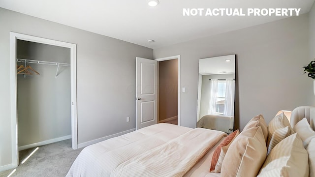 1789 Jacko Ln, Circleville, OH 43113 - bedroom with light colored carpet, a closet, baseboards, and recessed lighting