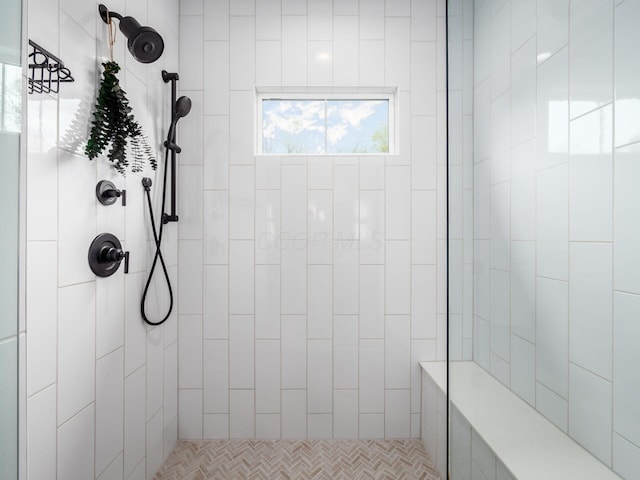 full bath with tiled shower