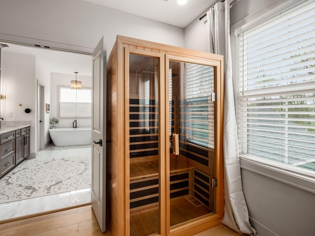 view of sauna / steam room featuring wood finished floors