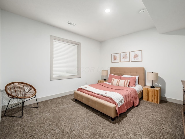 carpeted bedroom featuring baseboards, recessed lighting, and visible vents