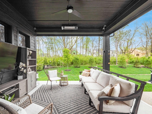 view of patio / terrace featuring ceiling fan and an outdoor living space