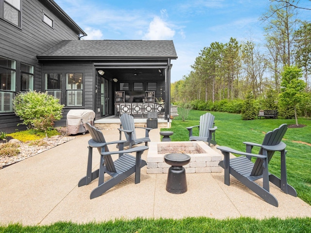 view of patio featuring an outdoor fire pit