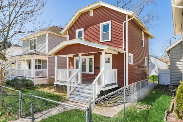 271 S Terrace Ave, Columbus, OH 43204 - view of front of home featuring a porch, fence, and a gate
