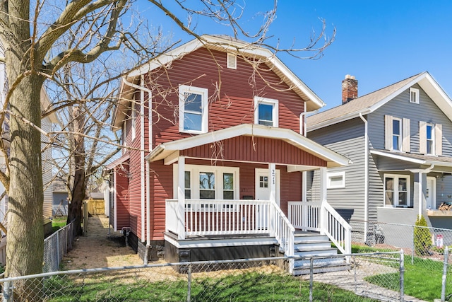 271 S Terrace Ave, Columbus, OH 43204 - view of front facade with covered porch, a fenced front yard, and a gate