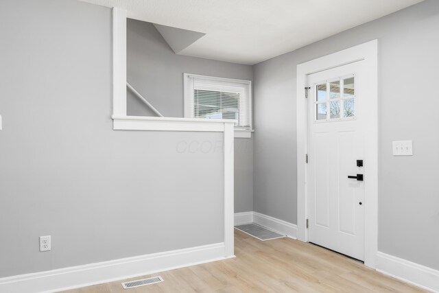271 S Terrace Ave, Columbus, OH 43204 - entrance foyer with visible vents, baseboards, and wood finished floors