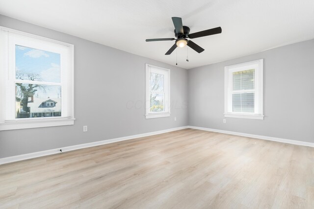 271 S Terrace Ave, Columbus, OH 43204 - unfurnished room featuring a wealth of natural light, light wood-style flooring, and baseboards