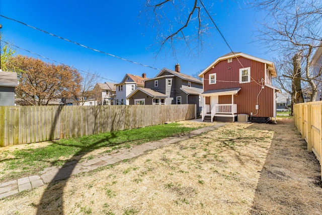271 S Terrace Ave, Columbus, OH 43204 - view of yard with a residential view, central AC unit, and fence