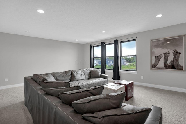 living area with recessed lighting and carpet floors
