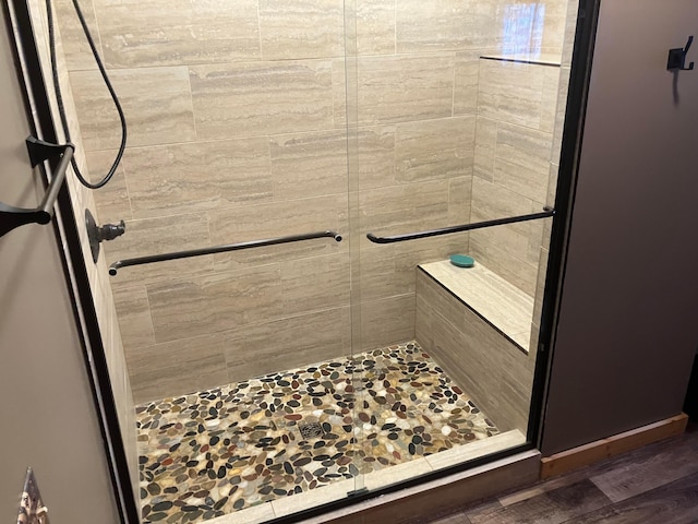 bathroom with a stall shower
