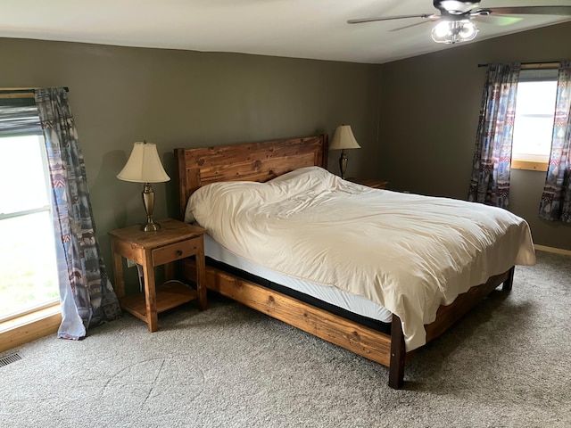 carpeted bedroom with a ceiling fan