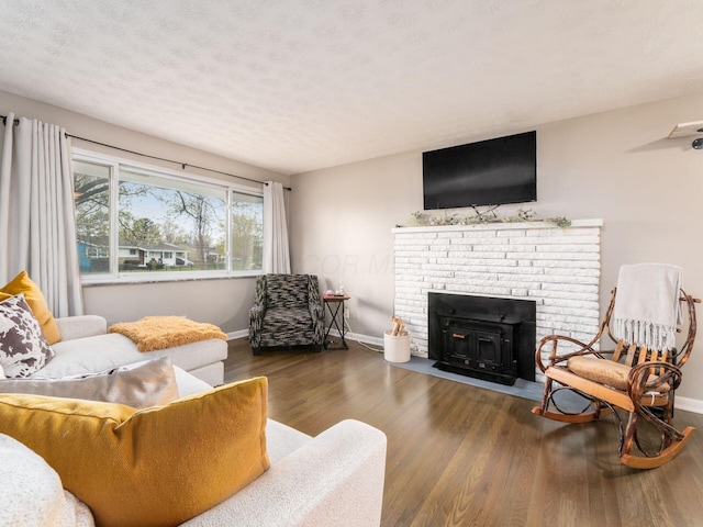 living room with baseboards and wood finished floors