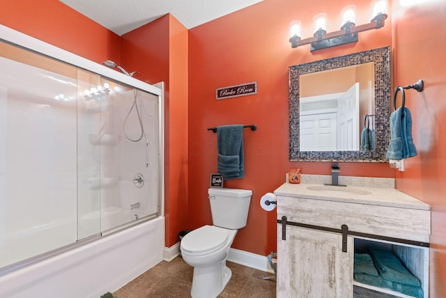 full bathroom featuring baseboards, combined bath / shower with glass door, toilet, vanity, and tile patterned floors
