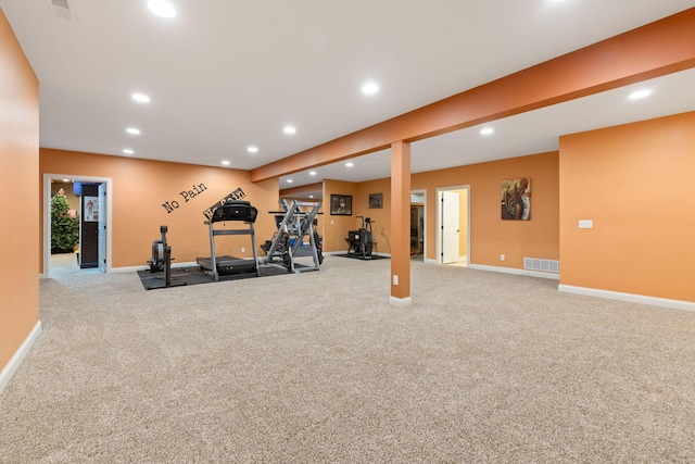 exercise area featuring visible vents, baseboards, recessed lighting, and carpet floors