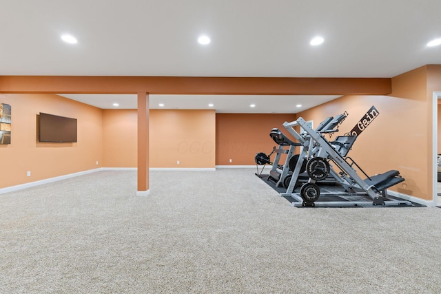 exercise room with baseboards, carpet, and recessed lighting