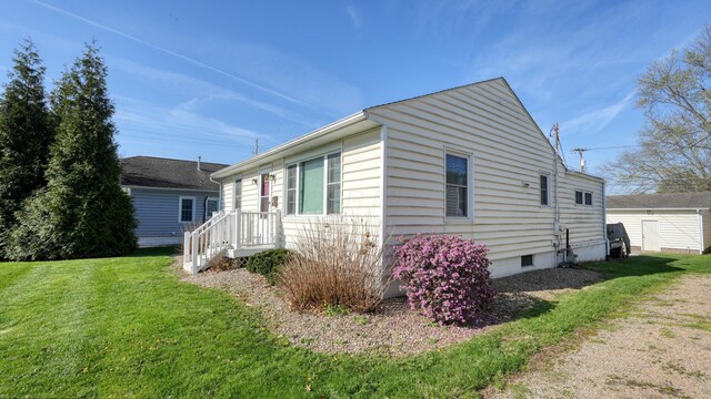 view of property exterior with crawl space and a lawn