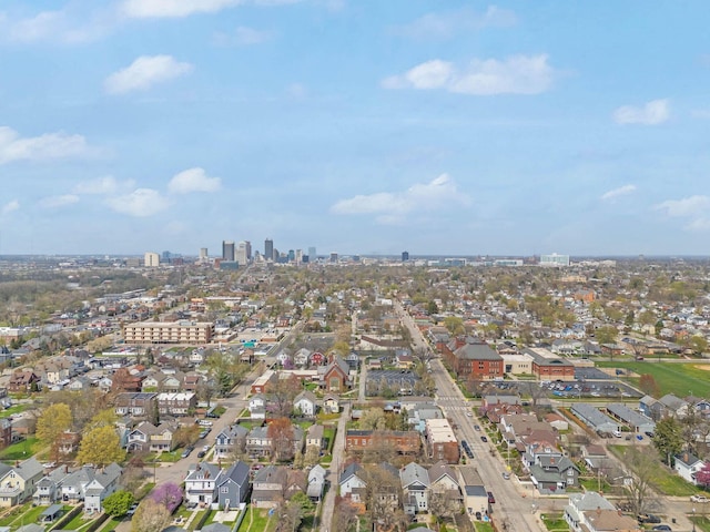 birds eye view of property featuring a view of city and a residential view