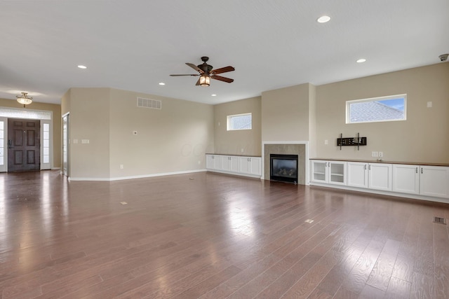5351 Lilac Ave, Grove City, OH 43123 - unfurnished living room featuring a ceiling fan, a fireplace, recessed lighting, and wood finished floors