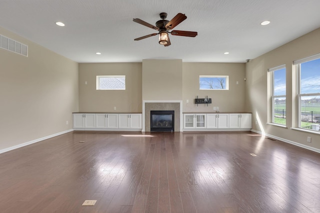 5351 Lilac Ave, Grove City, OH 43123 - unfurnished living room with plenty of natural light, a fireplace, recessed lighting, and a ceiling fan