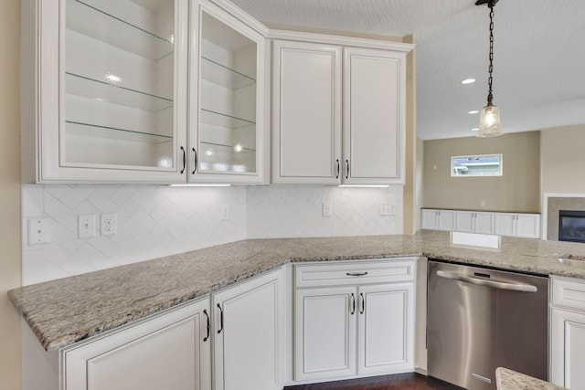 5351 Lilac Ave, Grove City, OH 43123 - kitchen with dishwasher, white cabinets, backsplash, and glass insert cabinets