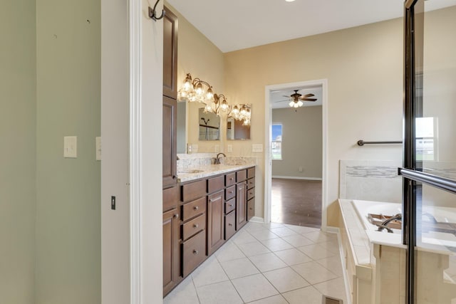5351 Lilac Ave, Grove City, OH 43123 - full bathroom featuring double vanity, tile patterned flooring, a bath, and a ceiling fan