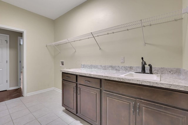 5351 Lilac Ave, Grove City, OH 43123 - laundry room featuring washer hookup and light tile patterned floors