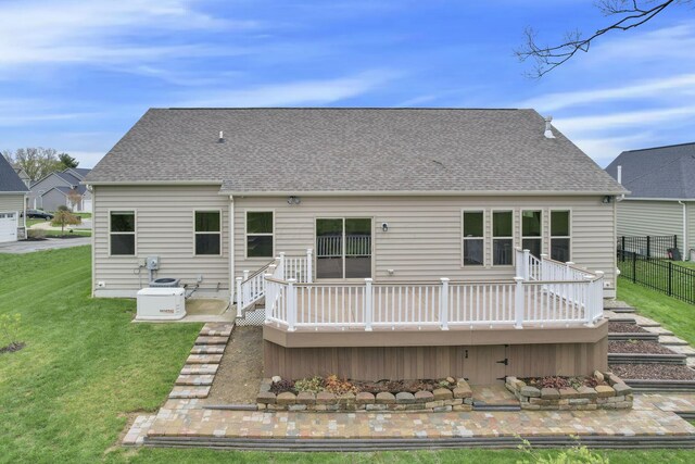 5351 Lilac Ave, Grove City, OH 43123 - back of house featuring a wooden deck, a shingled roof, and a patio