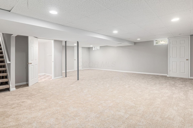 1148 Challis Springs Dr, New Albany, OH 43054 - finished basement featuring carpet floors, stairs, a paneled ceiling, baseboards, and recessed lighting