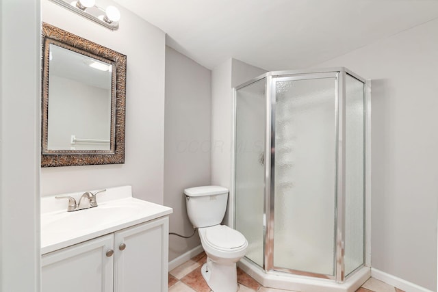 1148 Challis Springs Dr, New Albany, OH 43054 - bathroom with a shower stall, baseboards, vanity, toilet, and tile patterned floors