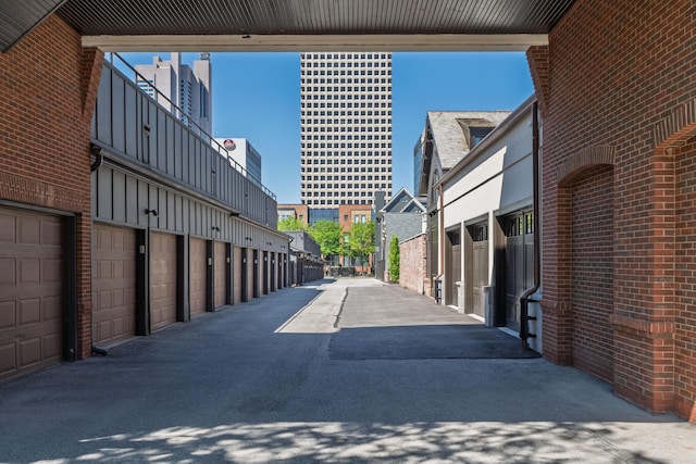 view of road with community garages