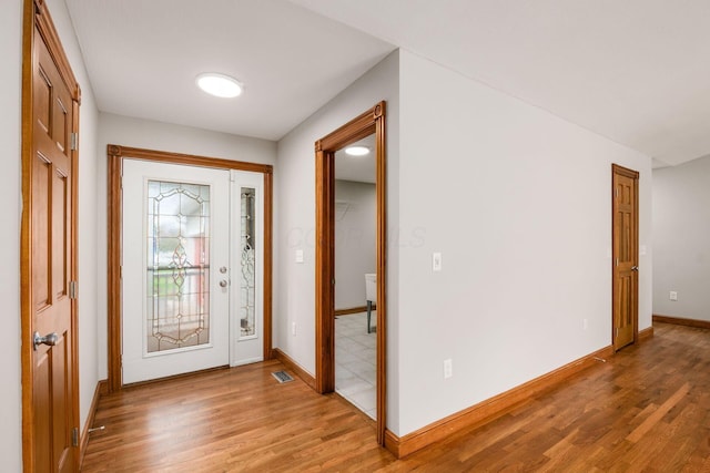 277 Cherrington Rd, Westerville, OH 43081 - entryway featuring visible vents, light wood-type flooring, and baseboards