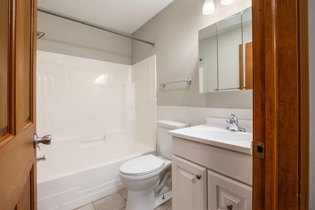 277 Cherrington Rd, Westerville, OH 43081 - full bath featuring toilet, tile walls, tub / shower combination, vanity, and tile patterned floors