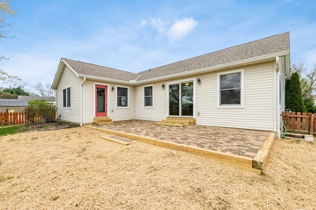 277 Cherrington Rd, Westerville, OH 43081 - rear view of house with entry steps, fence, and roof with shingles