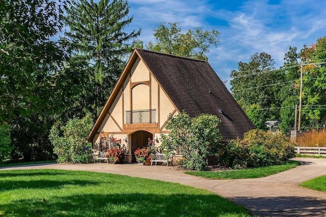 277 Cherrington Rd, Westerville, OH 43081 - english style home with stucco siding, fence, and a front yard