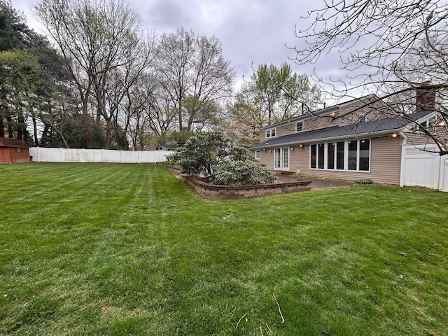 view of yard with fence