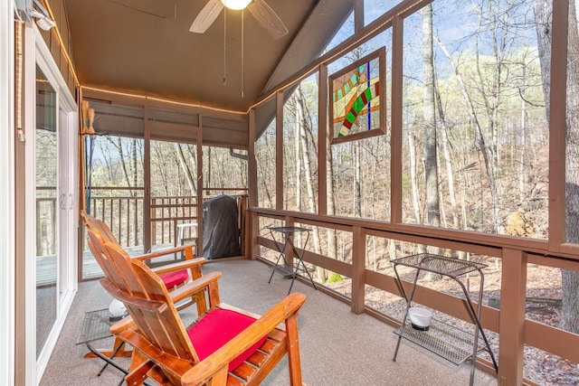 sunroom / solarium featuring ceiling fan and a wealth of natural light