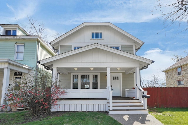 78 N Burgess Ave, Columbus, OH 43204 - traditional style home with board and batten siding, covered porch, and fence