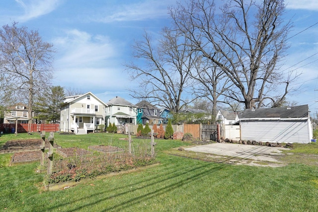 78 N Burgess Ave, Columbus, OH 43204 - view of yard with a residential view, fence, and a vegetable garden