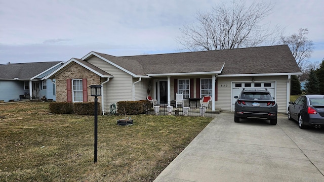 620 Lewis St, Washington Court House, OH 43160 - ranch-style house featuring a porch, a garage, concrete driveway, a front lawn, and roof with shingles